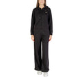 EA7 — Women’s black tracksuit